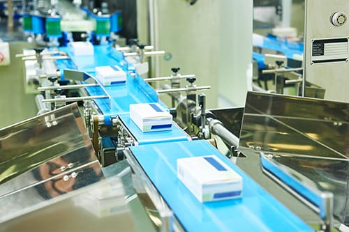 boxes of product on conveyor line