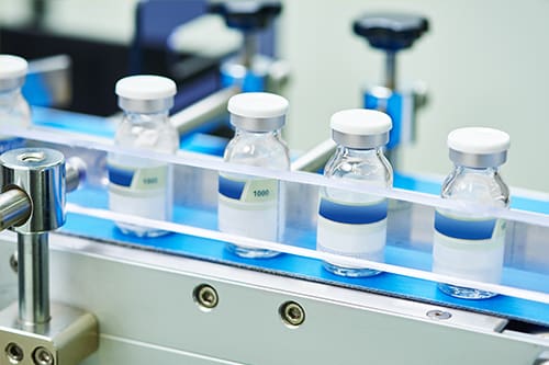 bottles on conveyor belt