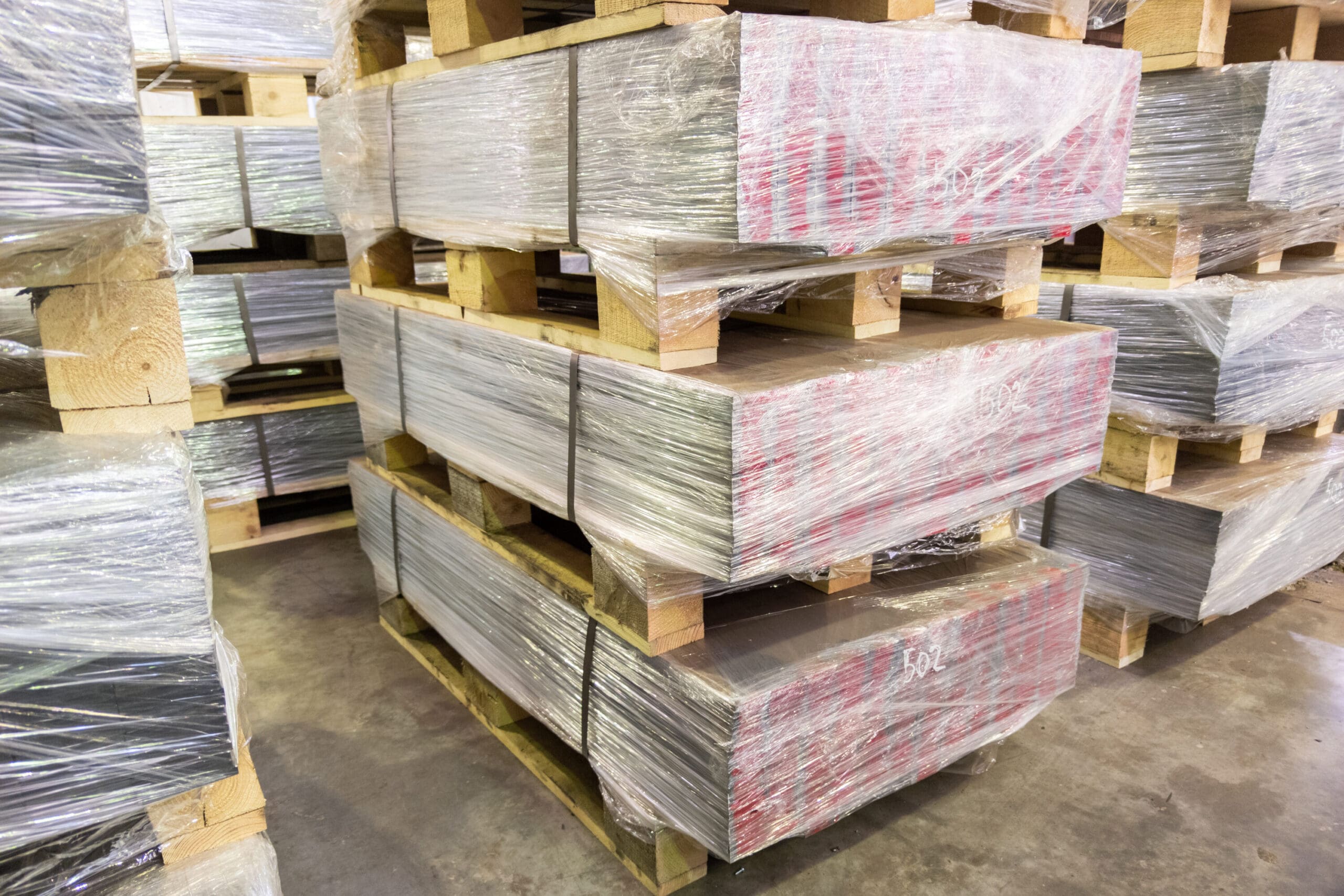 A bundle-wrapped pallet of cardboard