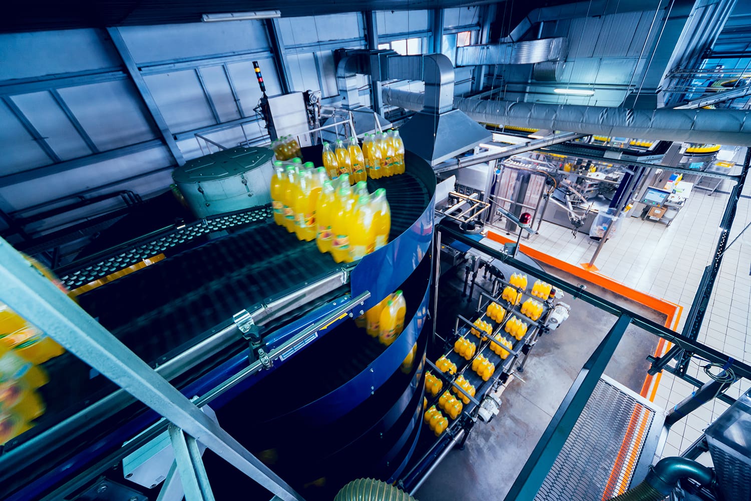 A packaging line dealing with bottles of liquid